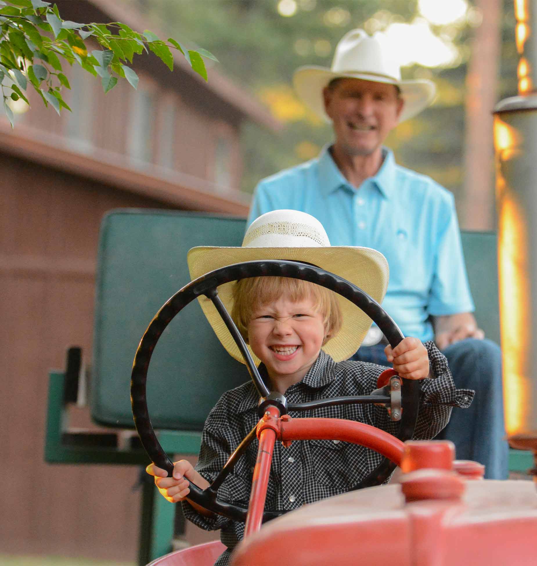 Montana - kids smiling on a tractor